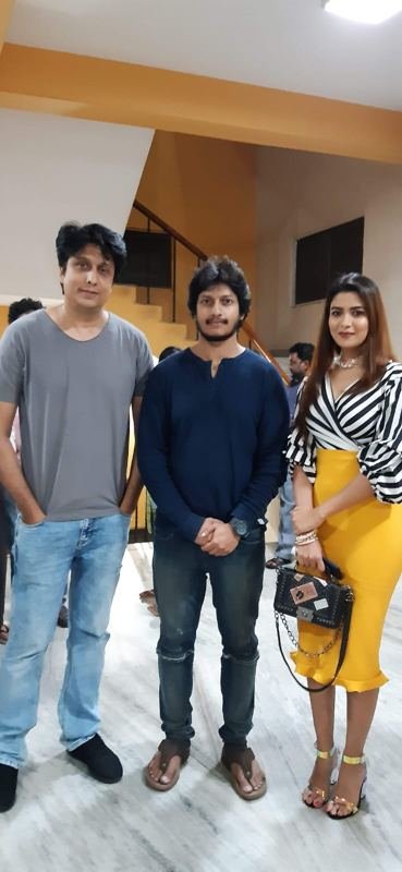 Three people at a screening venue